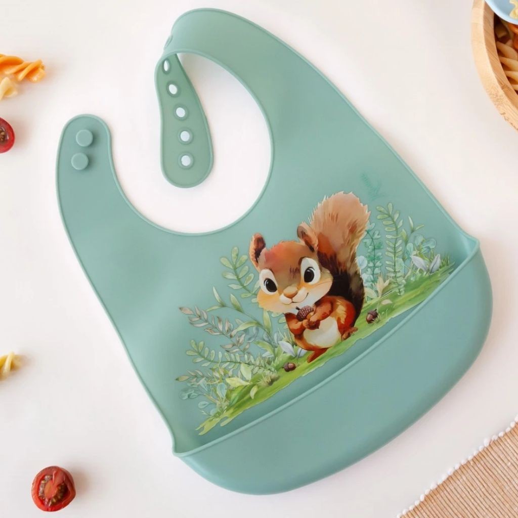 Babero silicona con recogemigas ardilla salvia