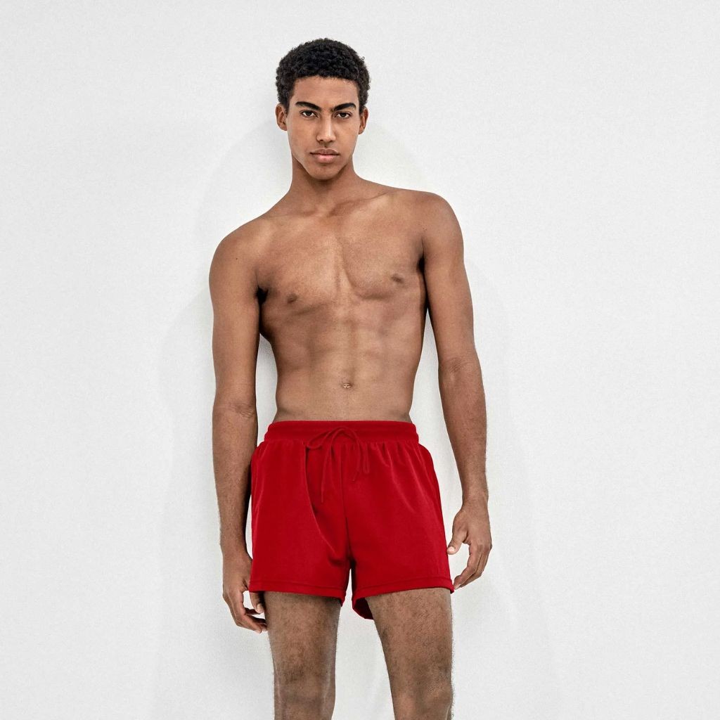 Ba&ntilde;ador hombre color liso bolsillos