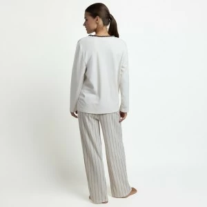 Pijama mujer manga larga cuello pico