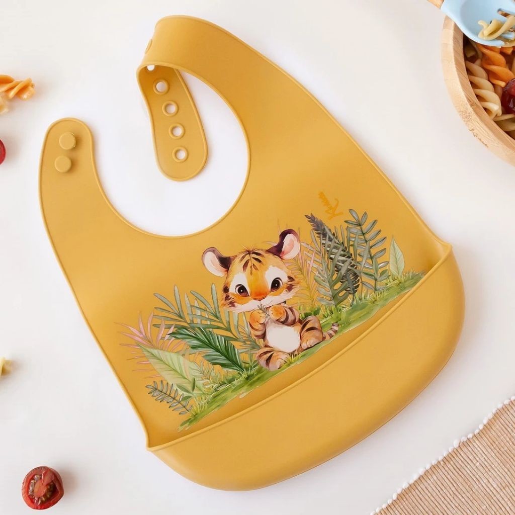 Babero silicona con recogemigas tigre mostaza