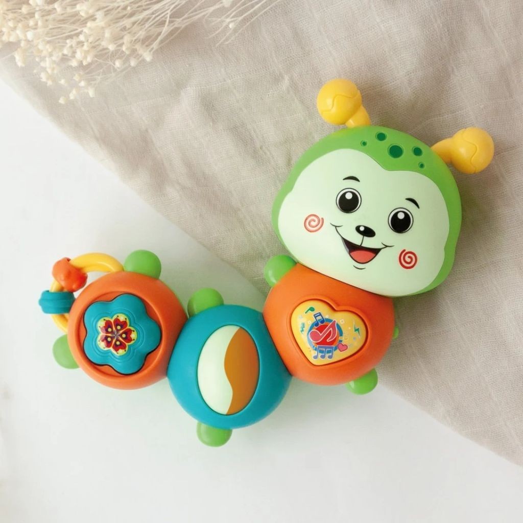 Juguete gusano musical de vivos colores + 12 meses