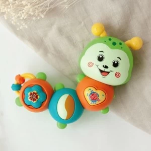 Juguete gusano musical de vivos colores + 12 meses