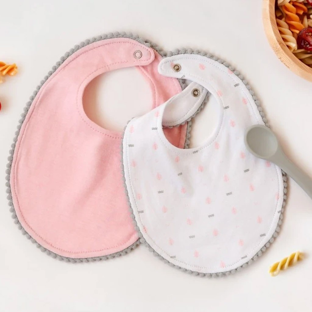 Babero bebe pack 2 unidades rosa con cucharita